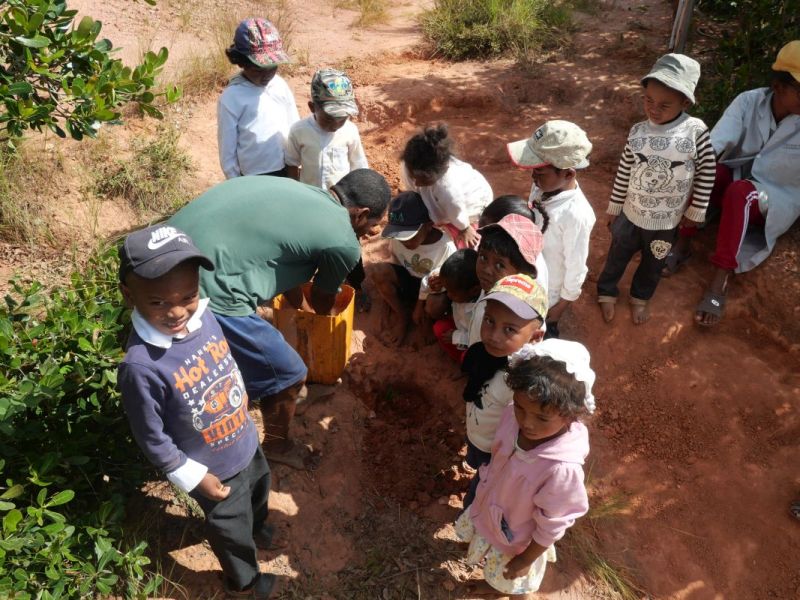 Reforestation with Made Christine and Young child of Loharanosoa Madagascar
